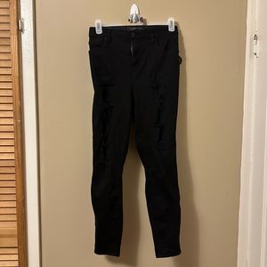 Black distressed skinny jeans
